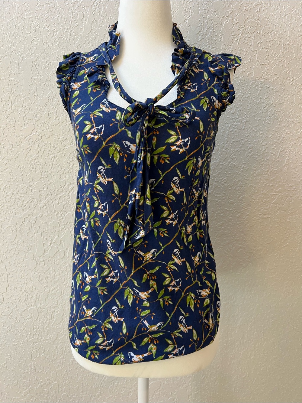 Anthropologie Navy Bird Print Tie-Neck Ruffle Cap Sleeve Blouse